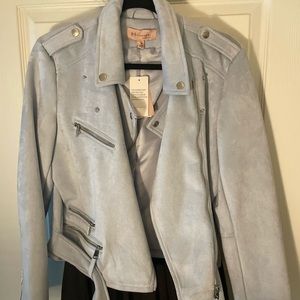 Never worn. Brand new with tags. Suede waist length jacket in powder blue.